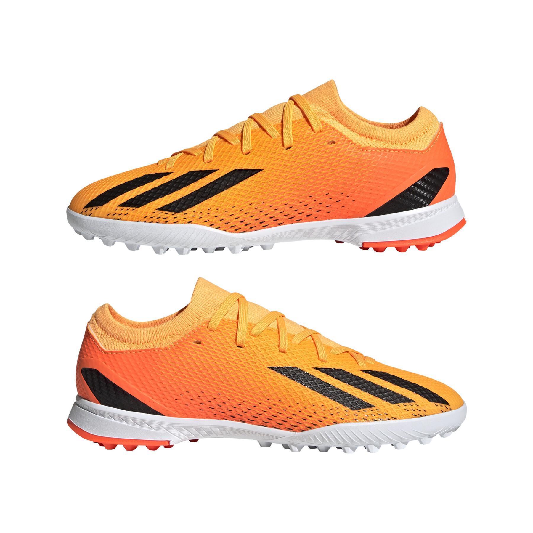 Sapatos de futebol para crianças adidas X Speedportal.3 Turf Heatspawn Pack