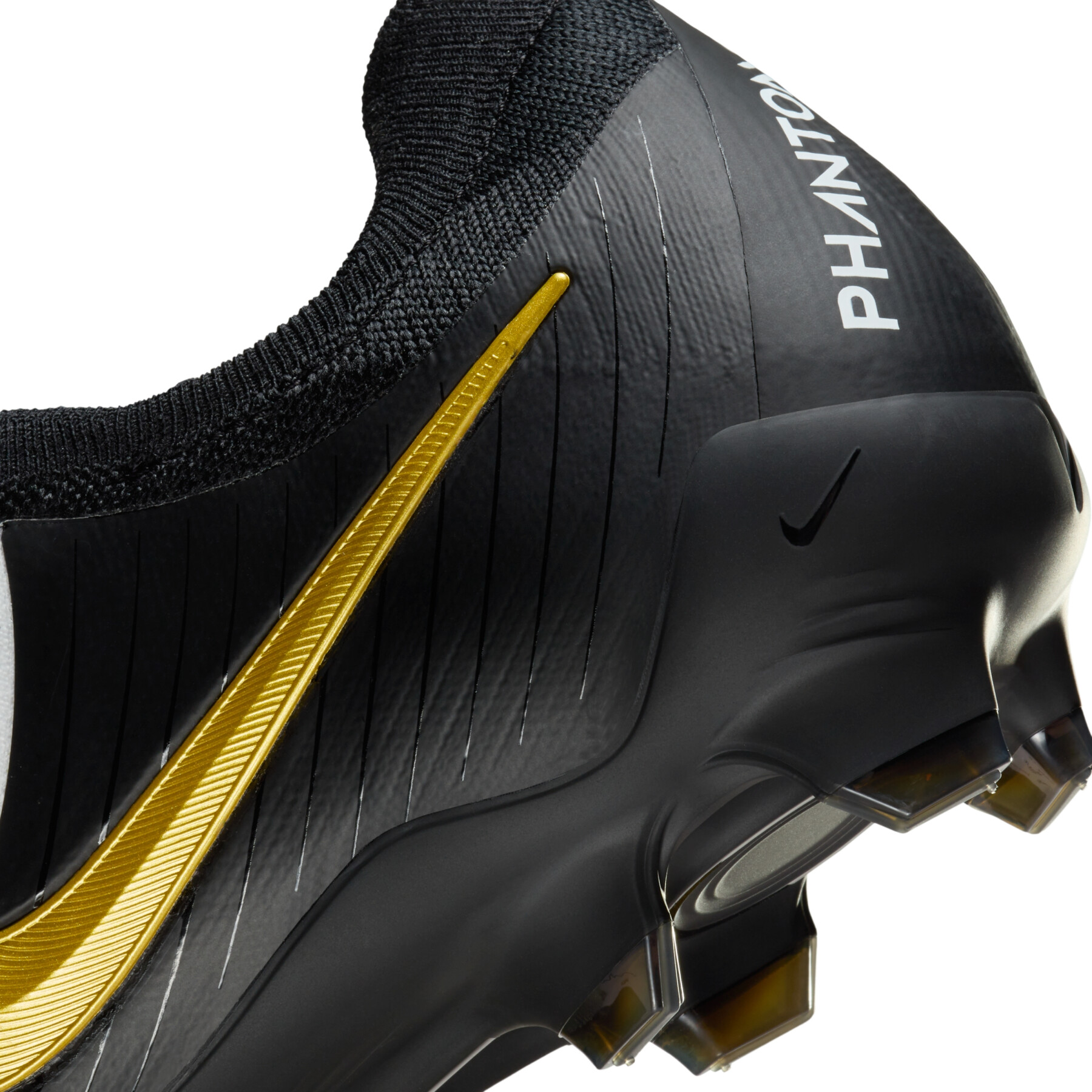 Sapatos de futebol para crianças Nike Phantom GX 2 Pro FG
