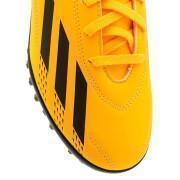 Sapatos de futebol para crianças adidas X Speedportal.4 Turf Heatspawn Pack