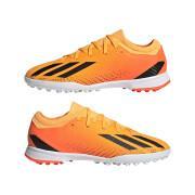 Sapatos de futebol para crianças adidas X Speedportal.3 Turf Heatspawn Pack