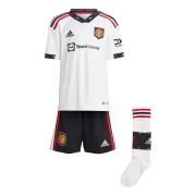 Mini kit de exterior para crianças Manchester United 2022/23